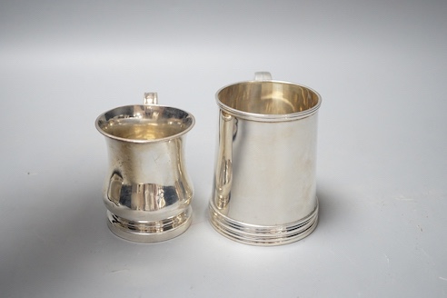 A George V silver christening mug, Goldsmiths & Silversmiths Co. Ltd, London, 1915, 85mm and a smaller Scottish silver christening mug, 9oz.